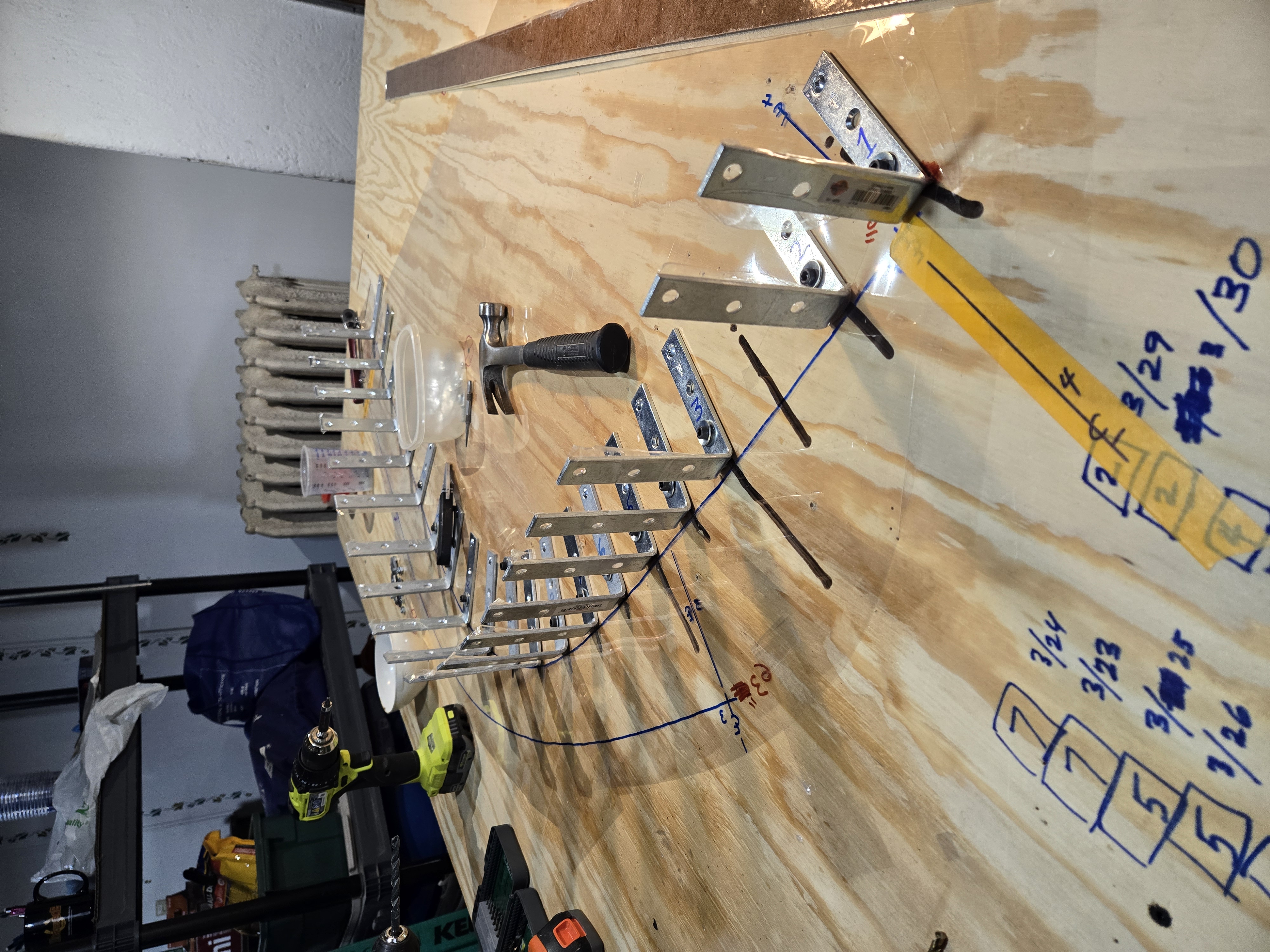 L-bracket cleats arranged to create the curve of a frame
