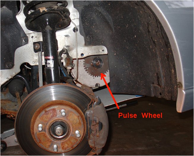 Pulse wheel mounted on auxiliary shaft